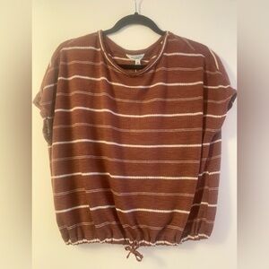 Super cute striped tee with cinched bottom. Size xsmall